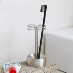 MONTESSA brushed stainless steel toothbrush holder with 4-slot clover design